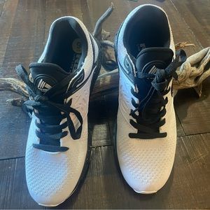 RBX men’s tennis, new without tags, never used. Size 9.